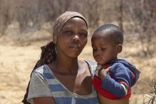 african-mother-holding-her-toddler